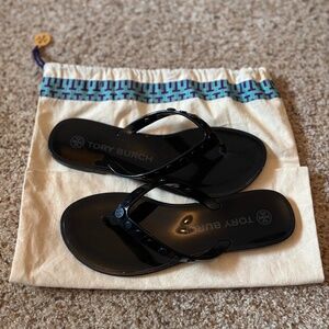 Tory Burch studded black rubber flip flop sandals, size 6